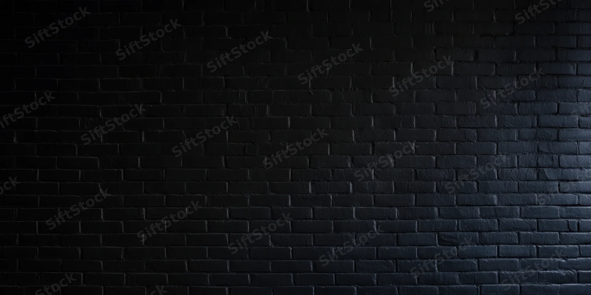 Dark brick wall with subtle texture under even low lighting