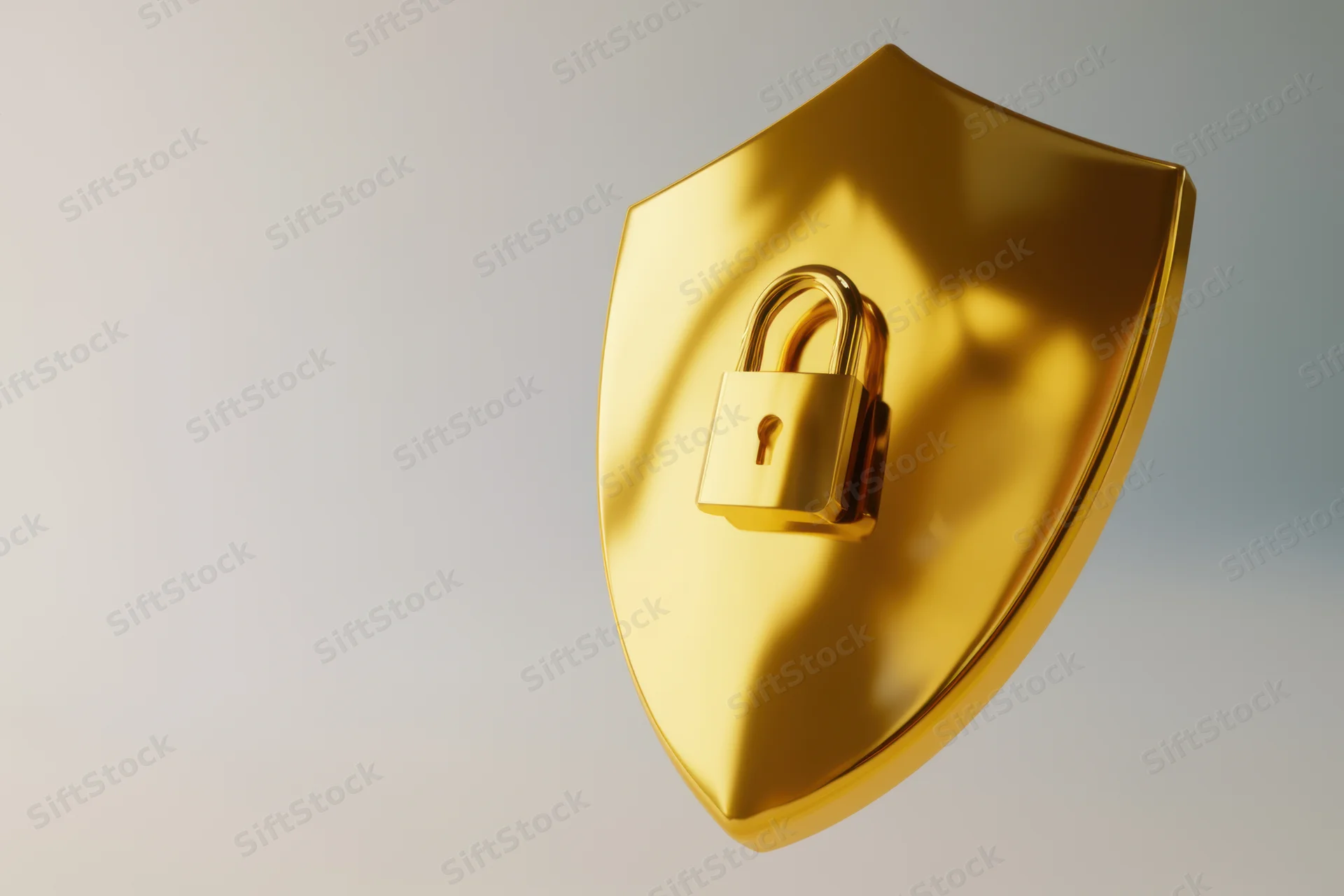 Golden shield with a padlock symbol centered on a plain background