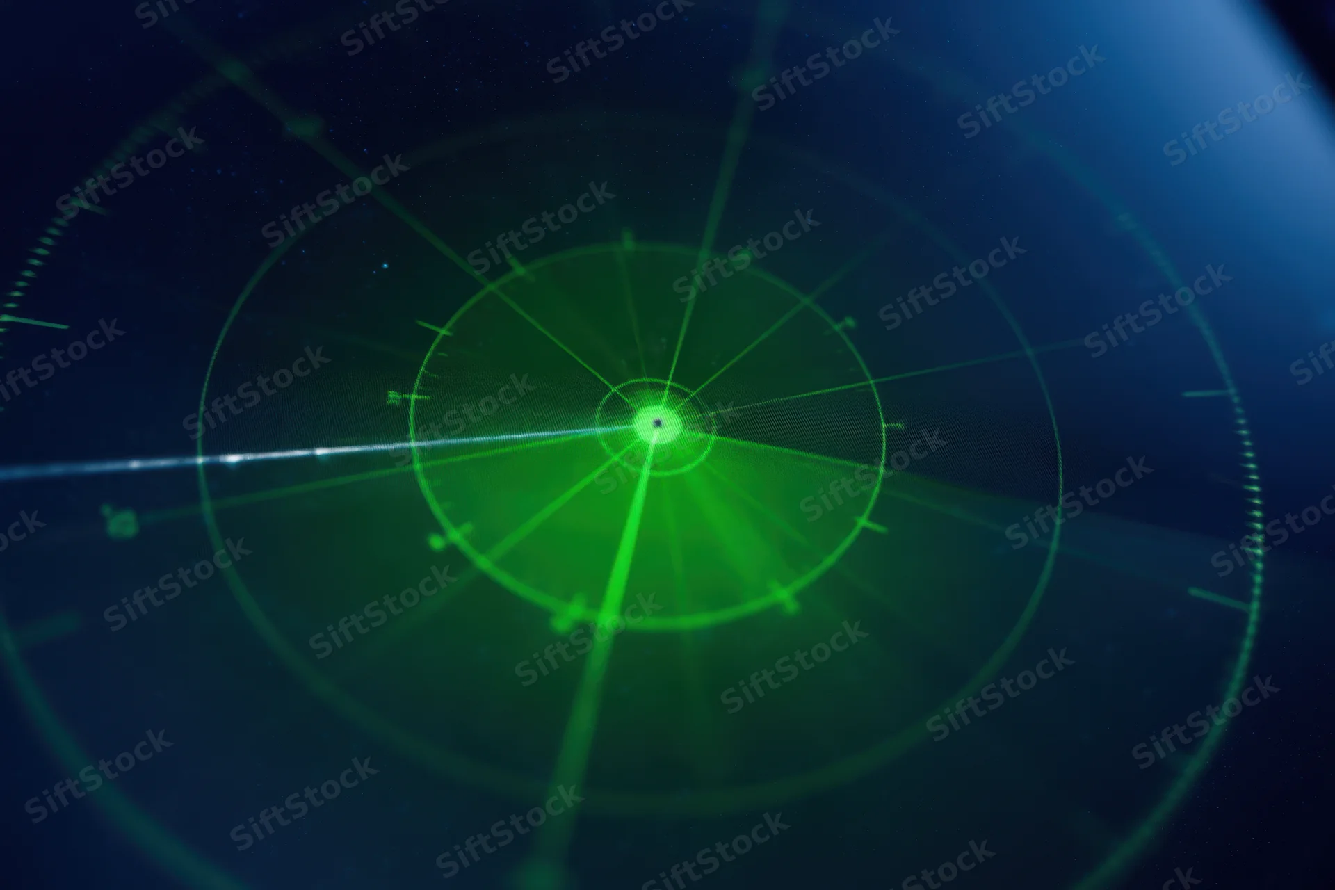 Green radar display with circular interface and concentric rings on dark screen