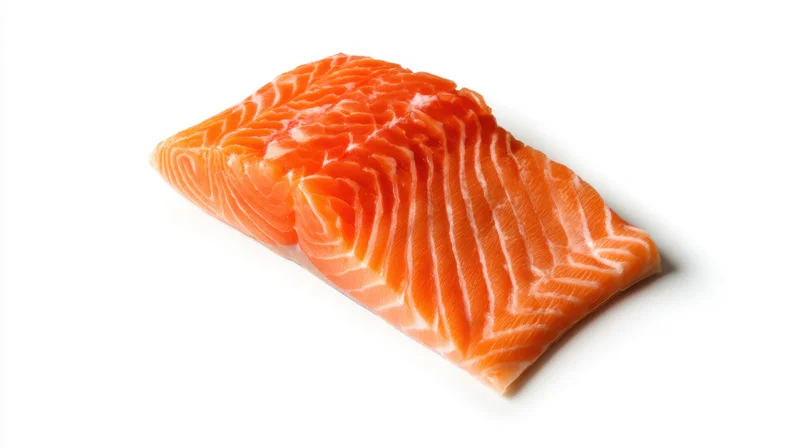 Fresh salmon fillet with vibrant orange color on white background