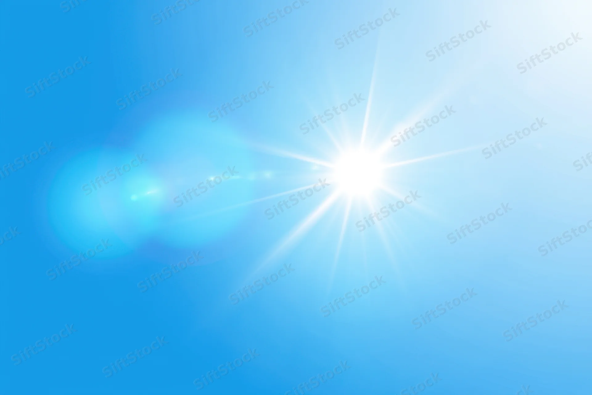 Bright sun shining on a blue gradient background with lens flare and soft glow