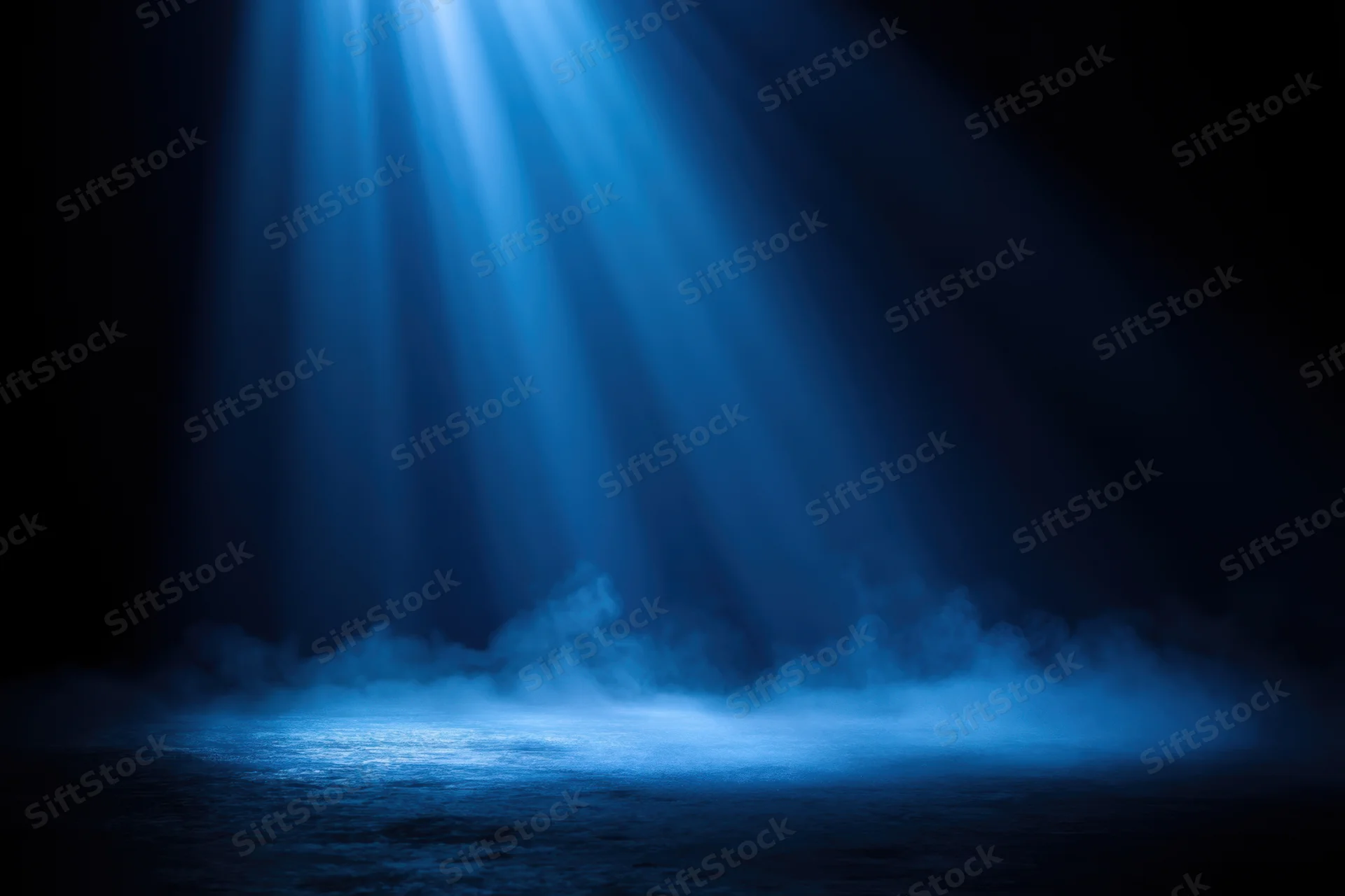 Soft blue light beams shining down through mist onto dark water surface