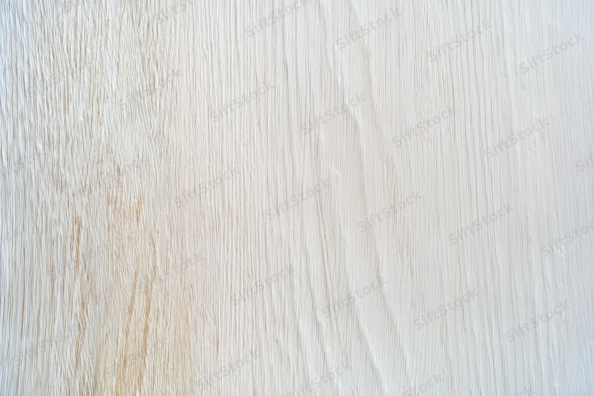 Smooth light weathered wood surface with visible grain pattern