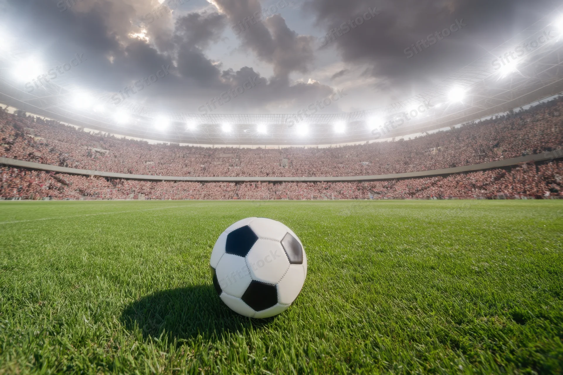 Of soccer stadium with a closeup view of a black and white ball