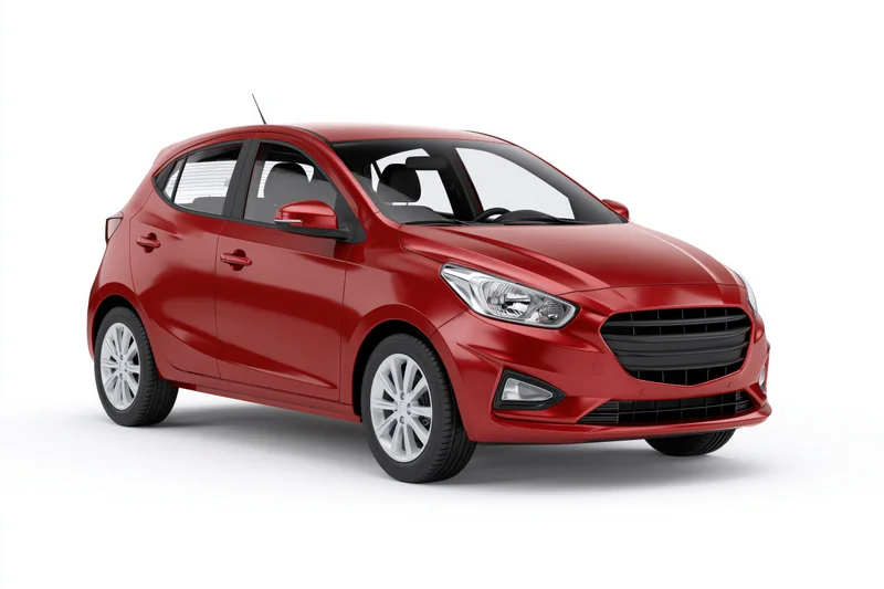 Red compact hatchback car parked and photographed in a studio with white background