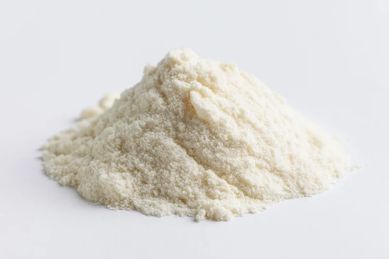 A mound of fine white powder on a plain white surface