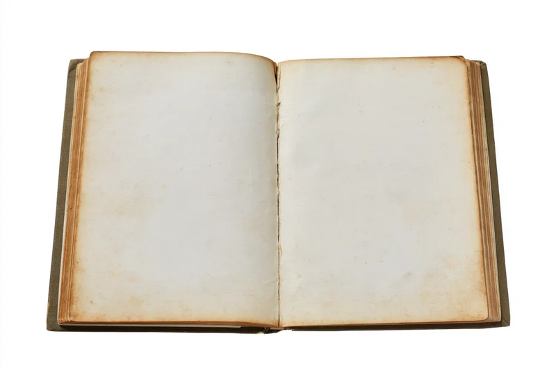 Old hardcover book lying open with blank pages fully visible