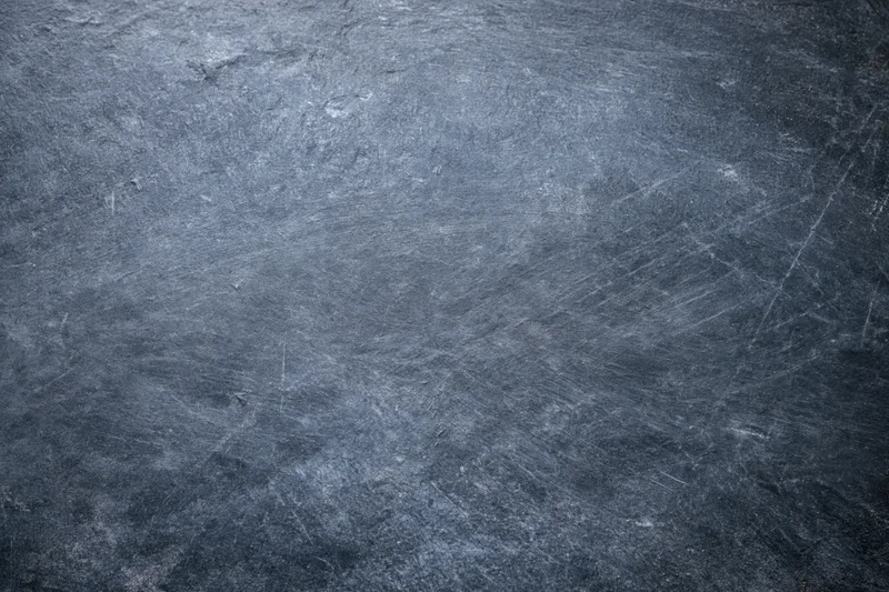 Weathered concrete slate surface in flat lay closeup view
