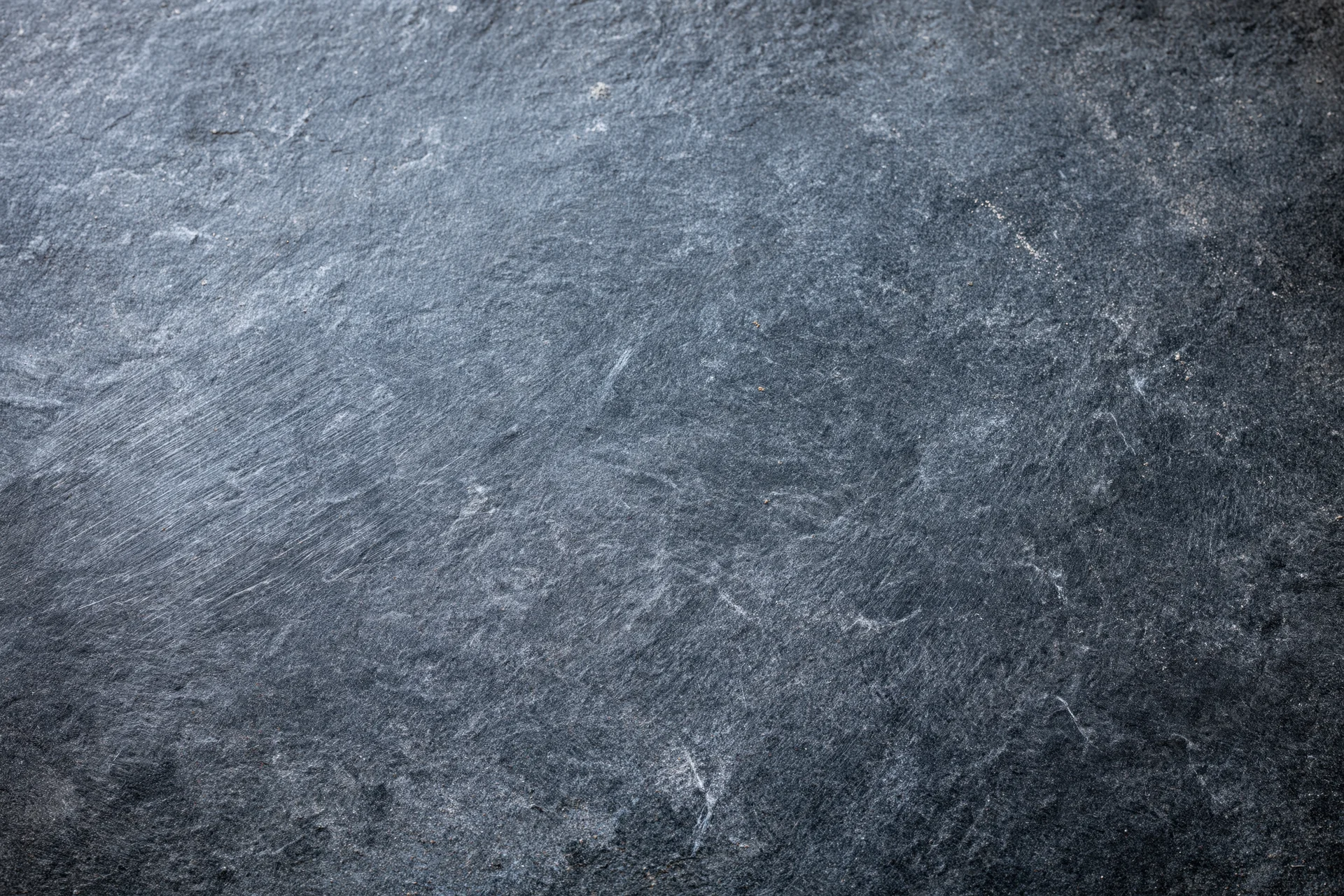 Weathered slate surface in close-up flat lay view