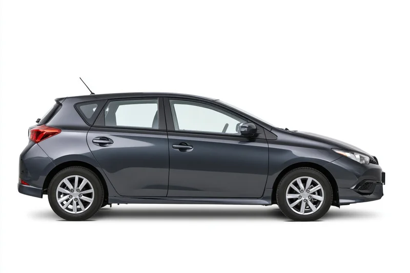 Dark grey compact hatchback car shown in clean side profile view against white background