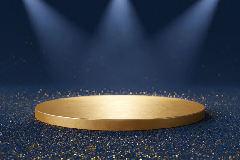 Golden circular podium on glittering navy blue floor under spotlights
