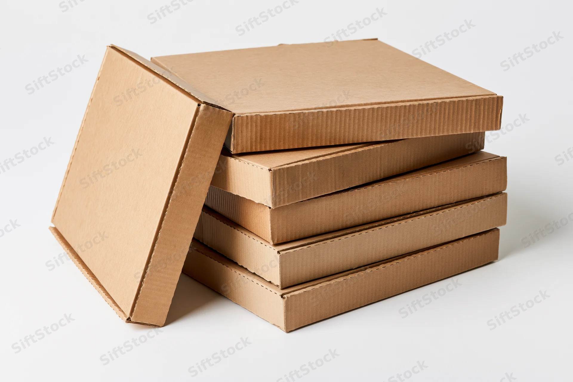 Stack of plain corrugated cardboard pizza boxes with one lid open, arranged vertically on white background