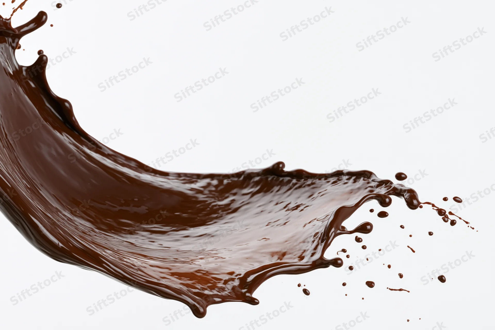 Dark chocolate liquid mid-splash frozen in motion sweeping across white background