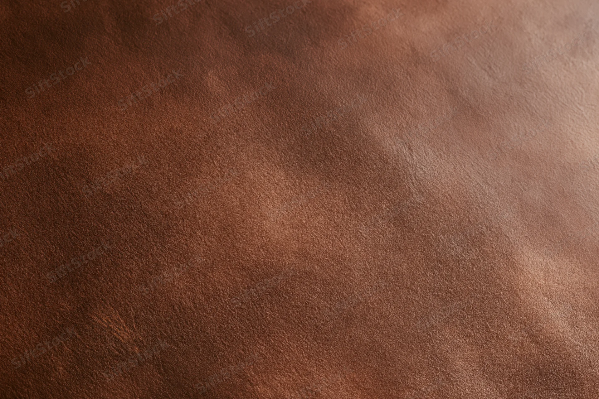 Plain matte brown surface filling the frame in close-up view
