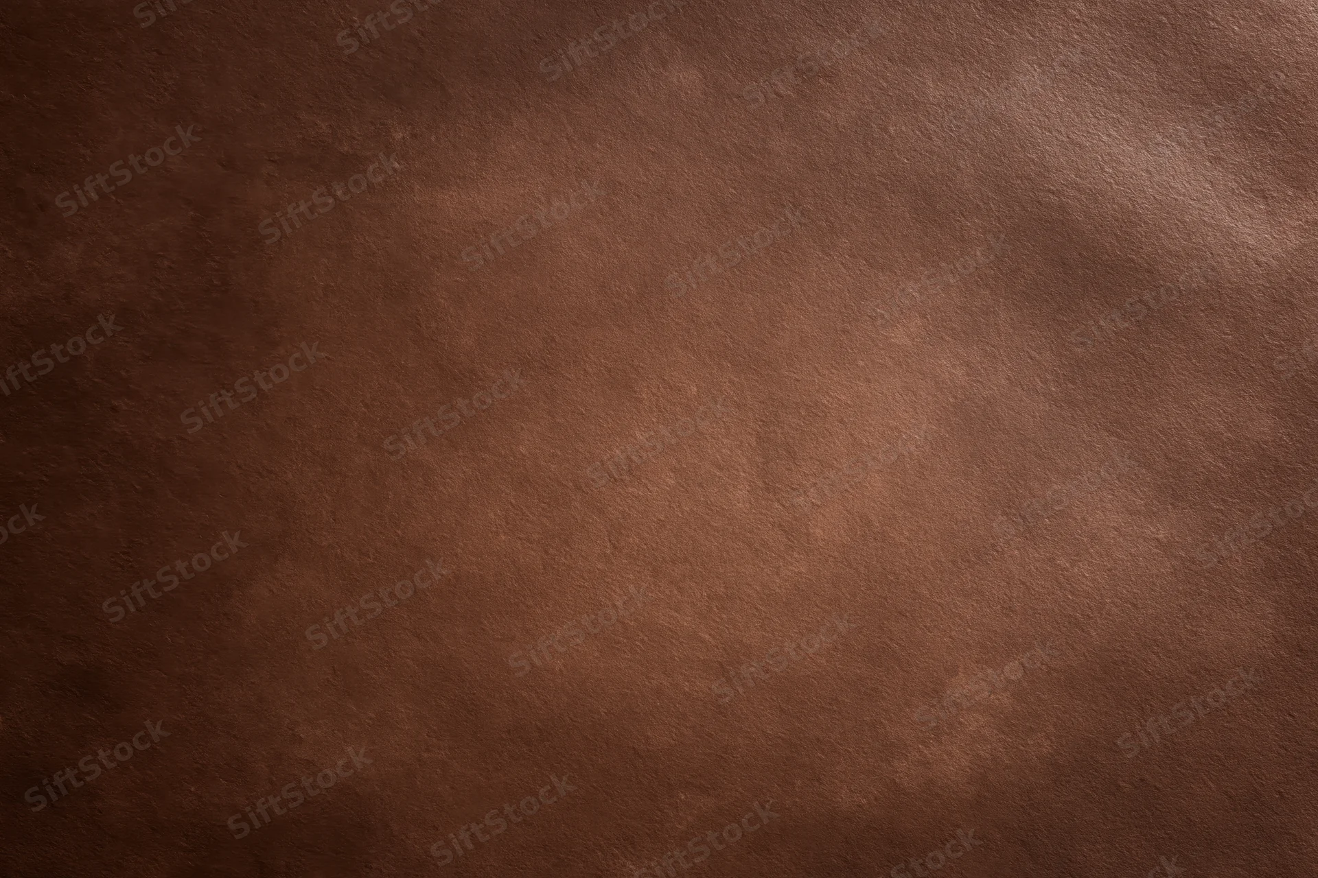 Plain matte brown surface filling the frame in close-up view