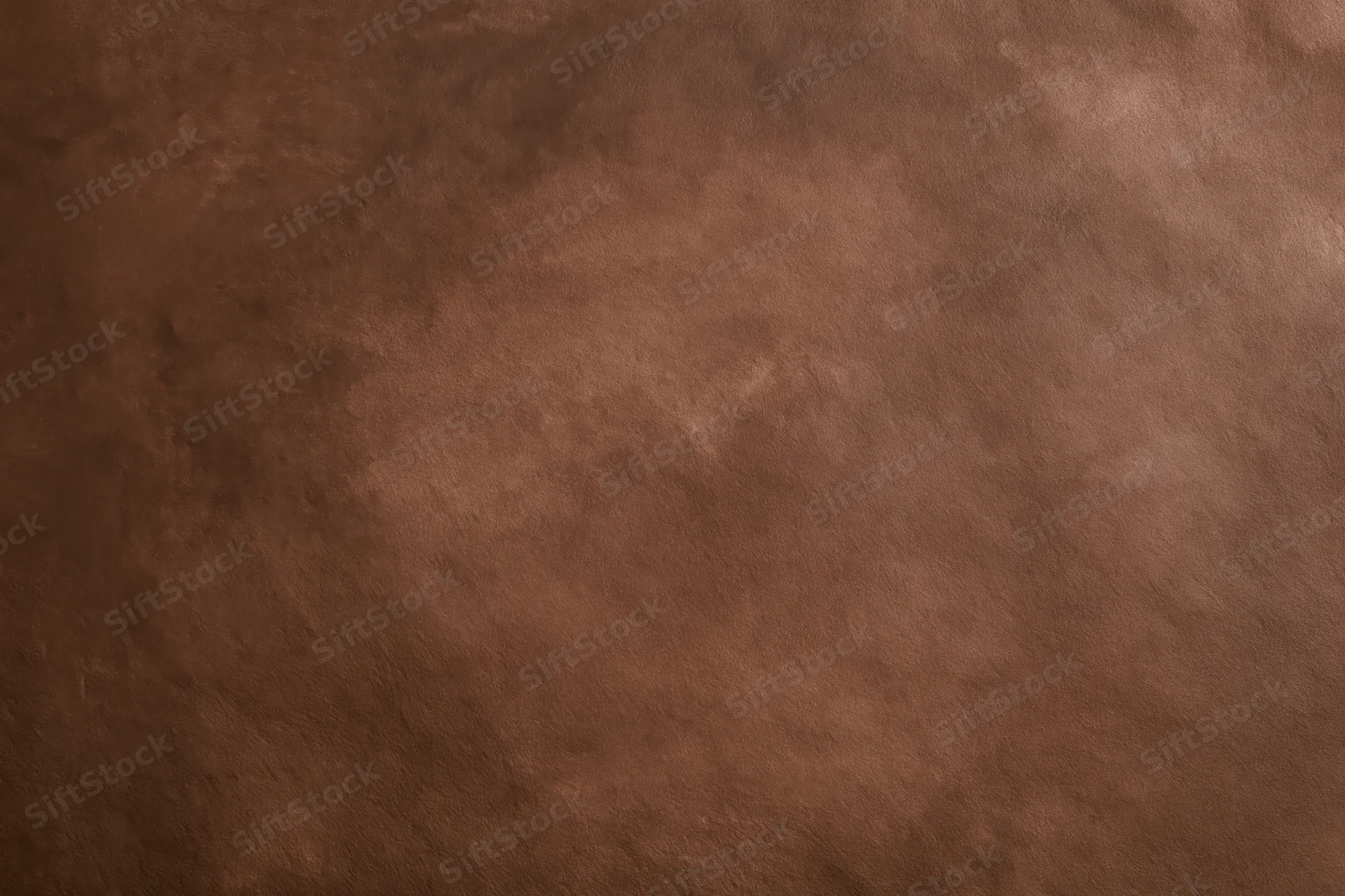 Plain matte brown surface filling the frame in close-up view