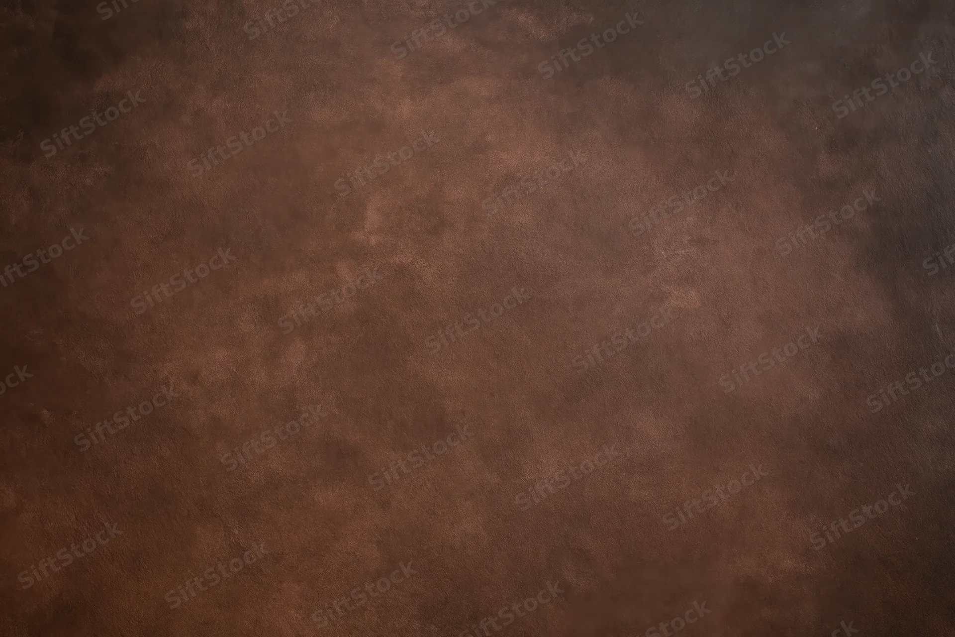 Plain mottled brown studio backdrop texture with no subject
