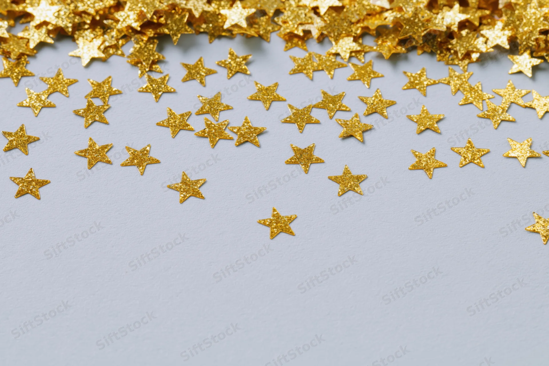 Gold metallic star-shaped confetti