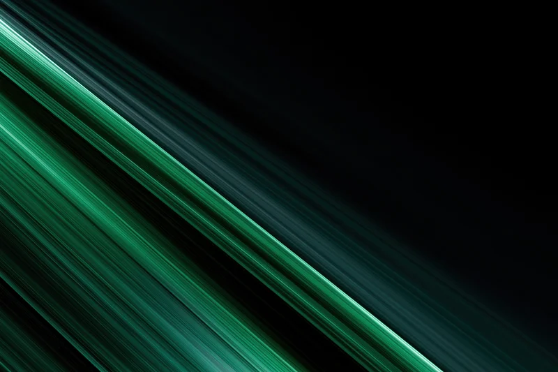 Diagonal green motion blur streaks across dark background with copyspace