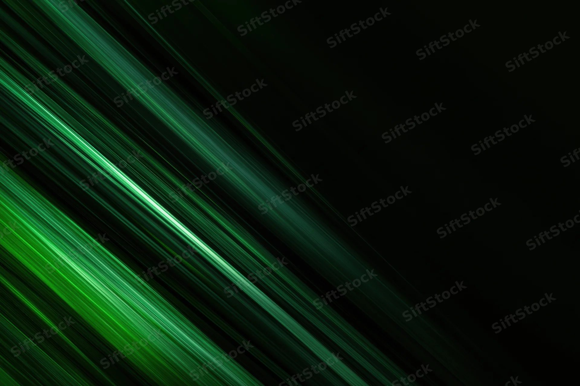 Diagonal green light streaks in motion blur against dark background with copyspace
