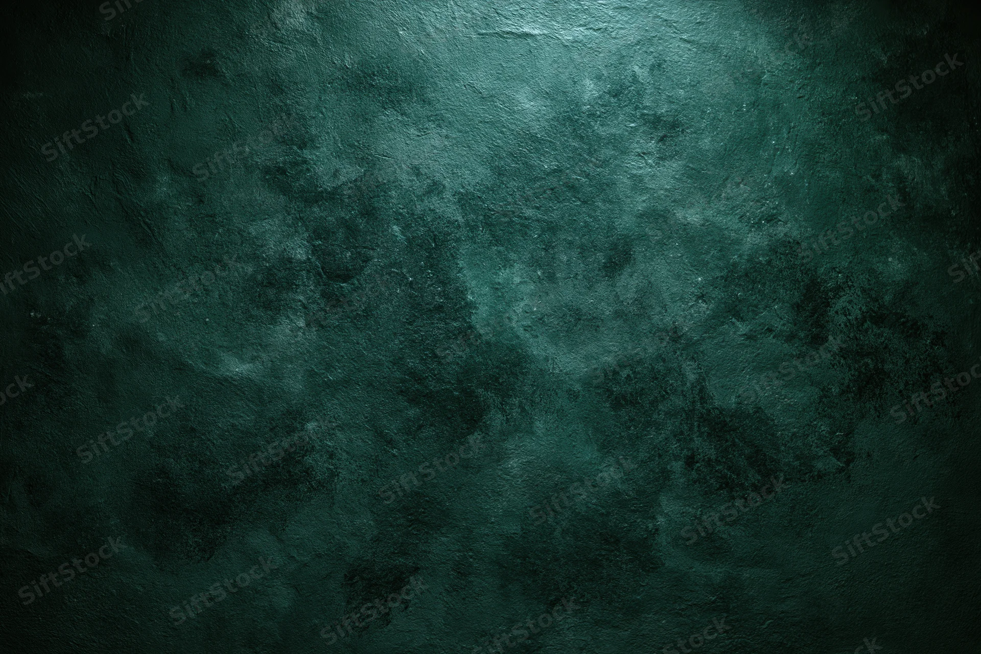 Textured dark green surface filling the frame as a background