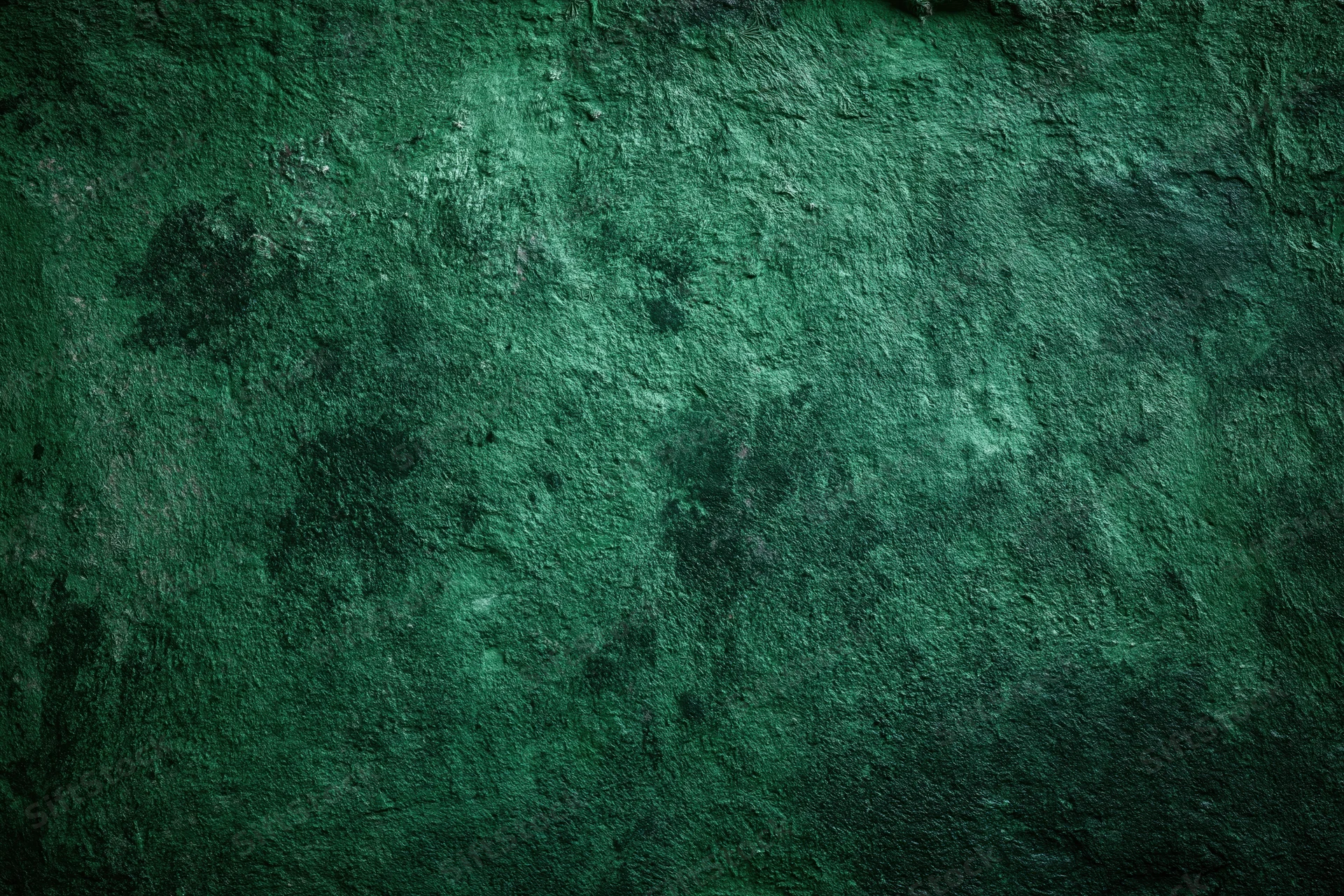 Textured green surface filling the frame as a background