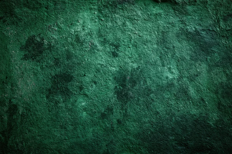 Textured green surface filling the frame as a background