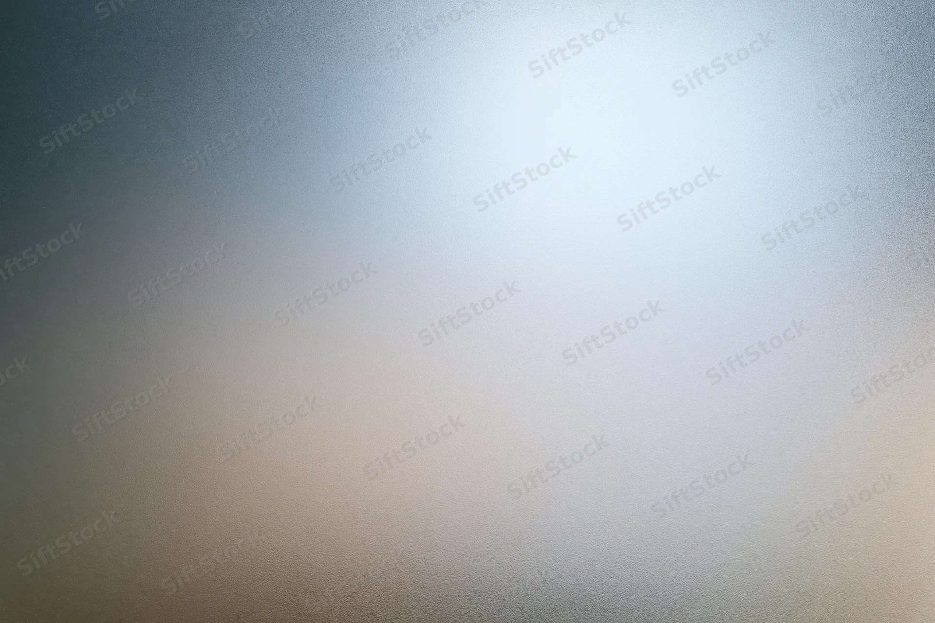 Frosted glass surface with smooth gradient texture in flat lay closeup