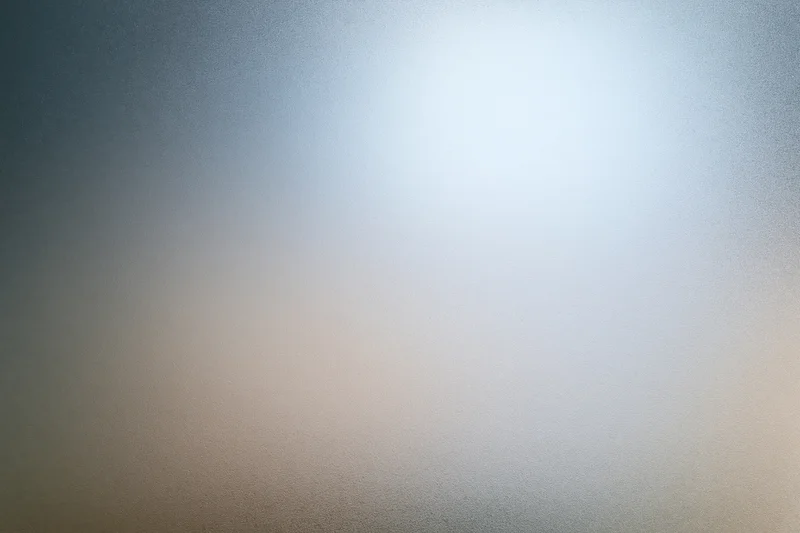 Frosted glass surface with smooth gradient texture in flat lay closeup