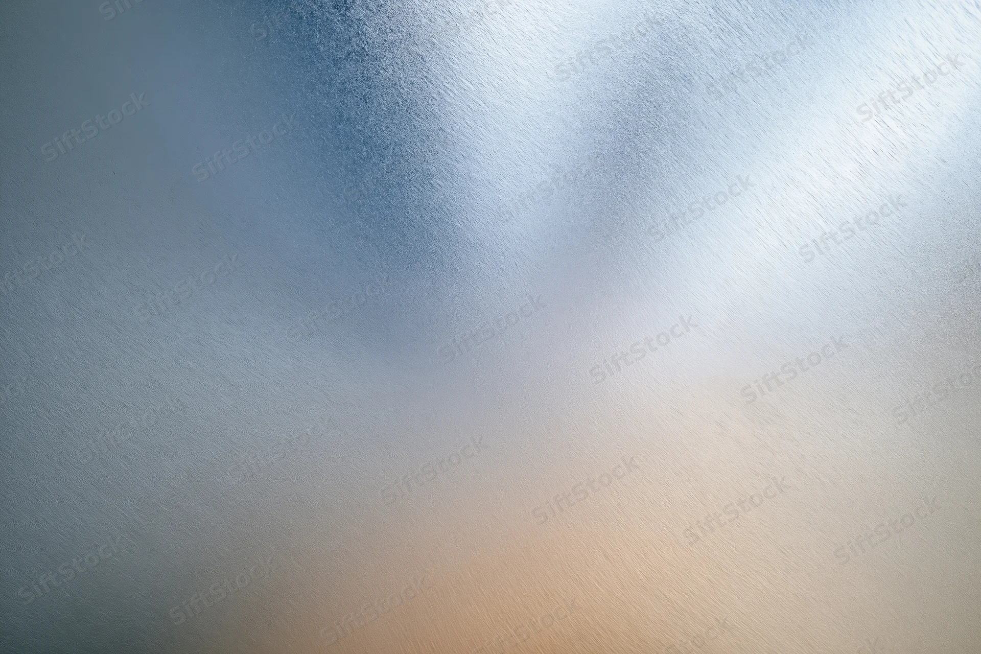 Frosted glass surface with brushed metal texture in flat lay closeup