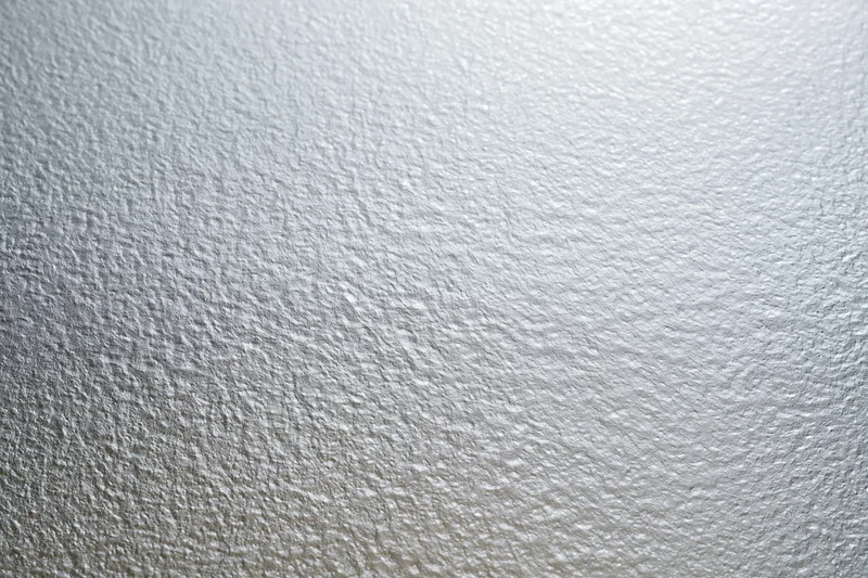 Close-up flat lay of a frosted glass surface with fine textured pattern