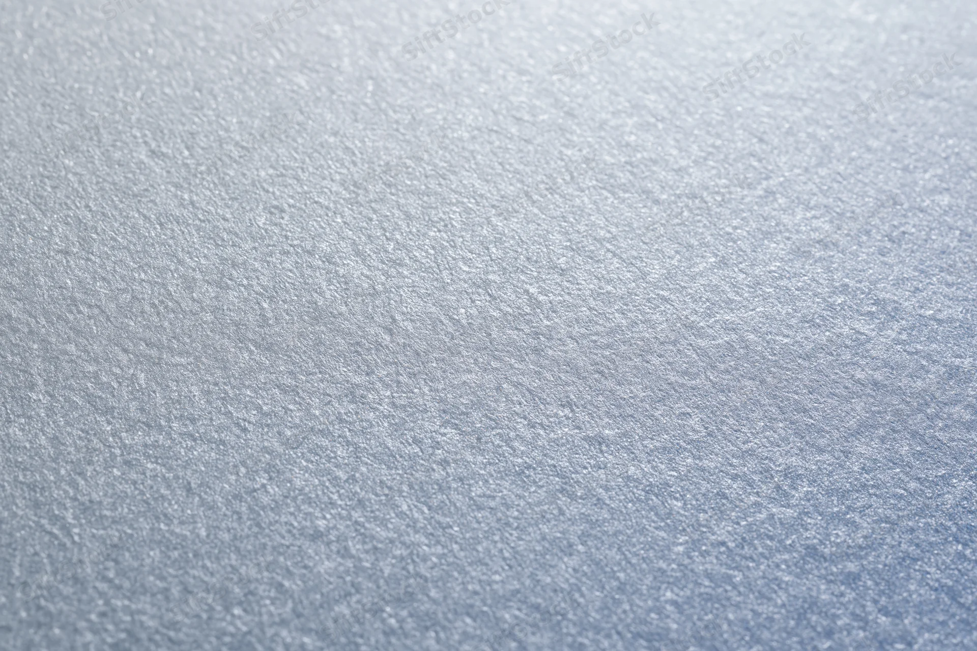 Frosted glass surface in close-up flat lay view filling the frame