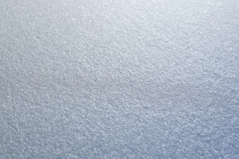 Frosted glass surface in close-up flat lay view filling the frame