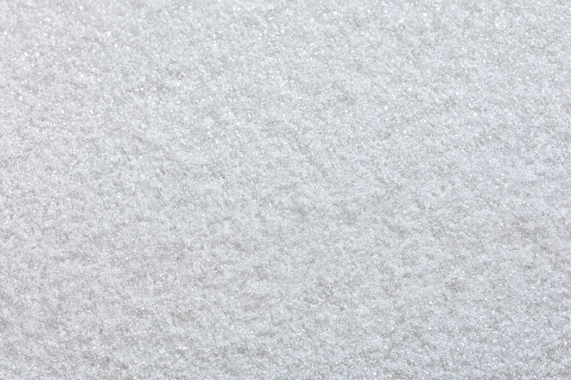 Close-up flat lay of a frosted white metal surface with textured grain pattern