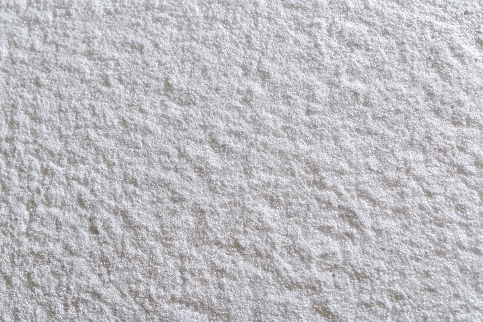 Close-up of a white expanded polystyrene foam sheet surface