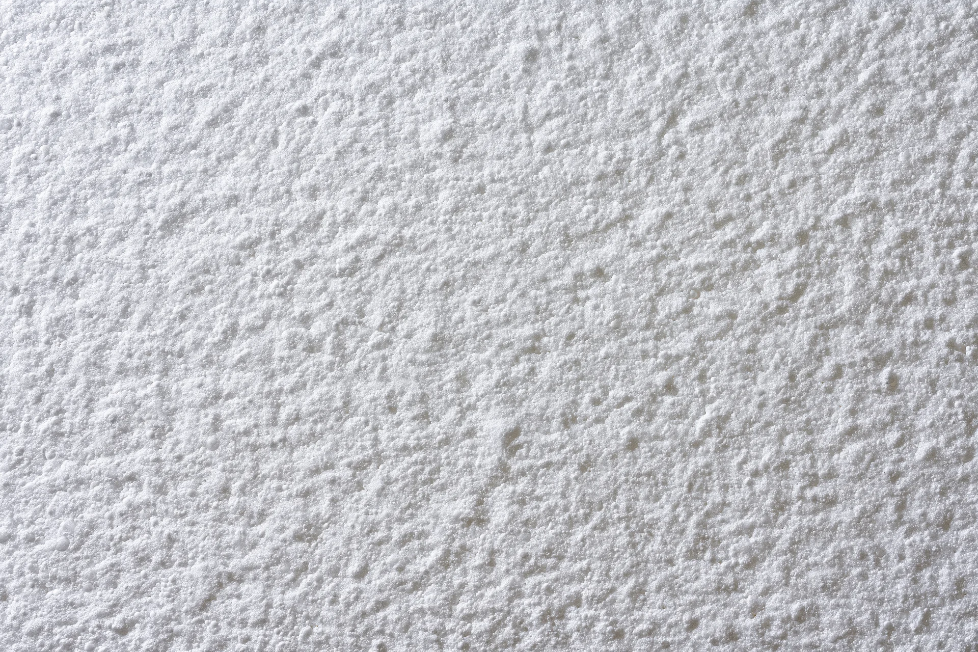 Close-up of white expanded polystyrene foam sheet surface