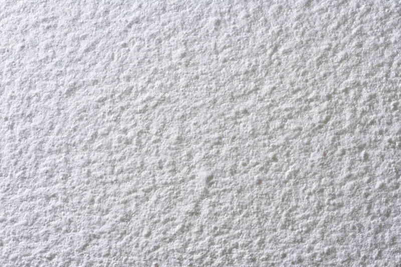 Close-up of white expanded polystyrene foam sheet surface