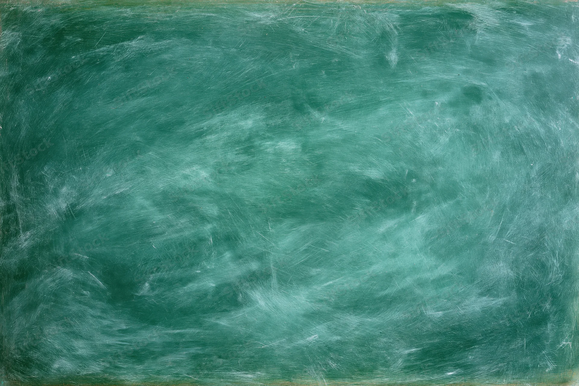 Worn green chalkboard surface with smudges and dust in flat lay view