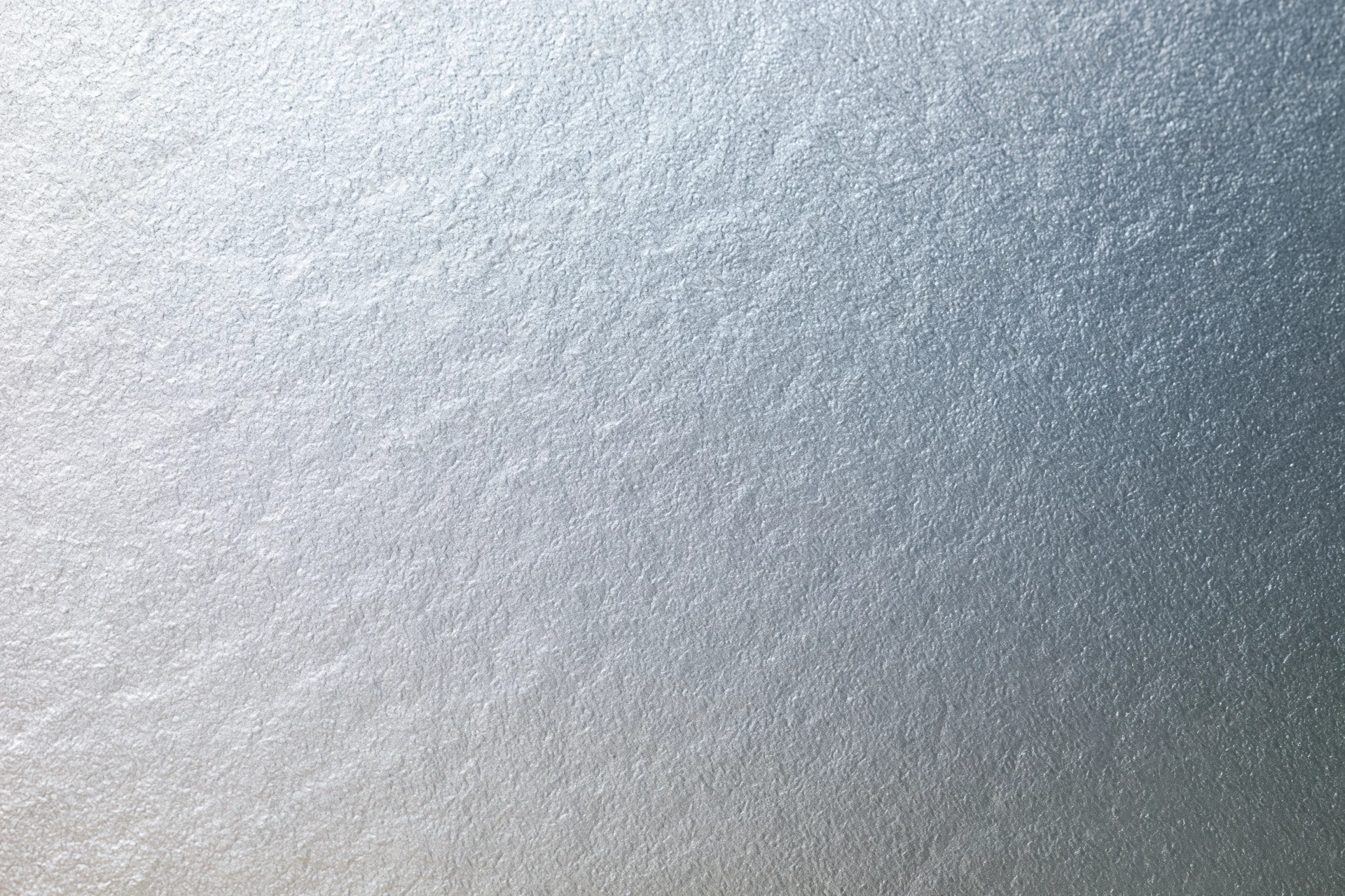 Frosted glass surface with smooth matte texture filling the frame
