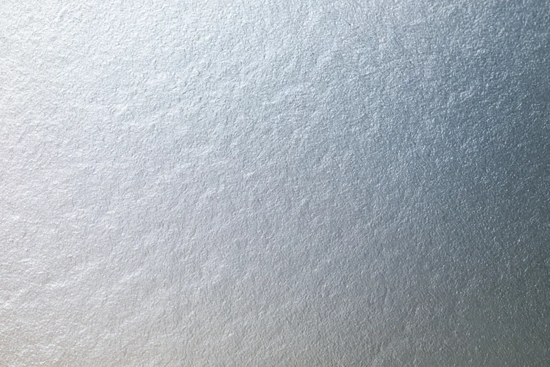 Frosted glass surface with smooth matte texture filling the frame