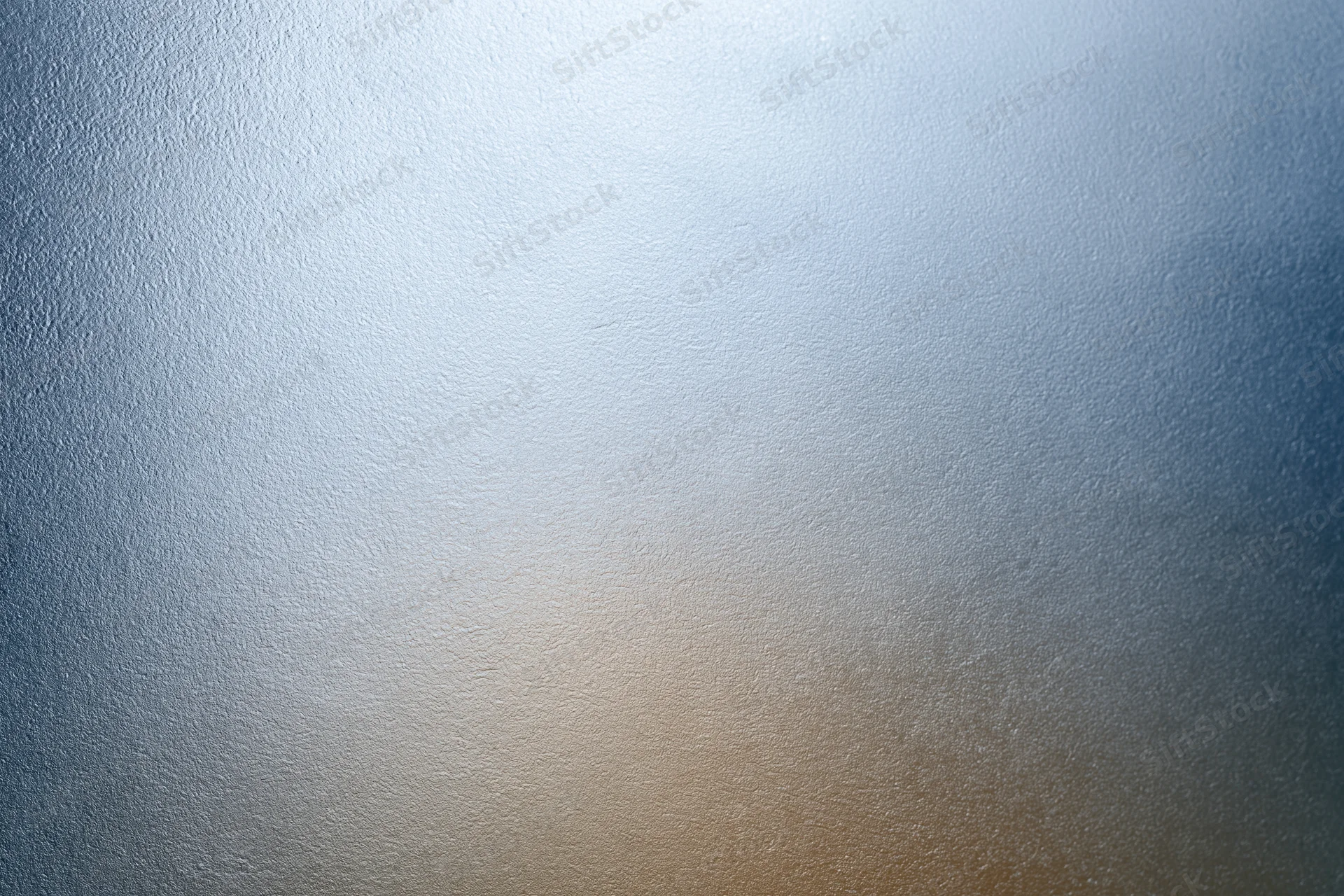 Frosted glass surface with smooth texture and light gradient filling the frame