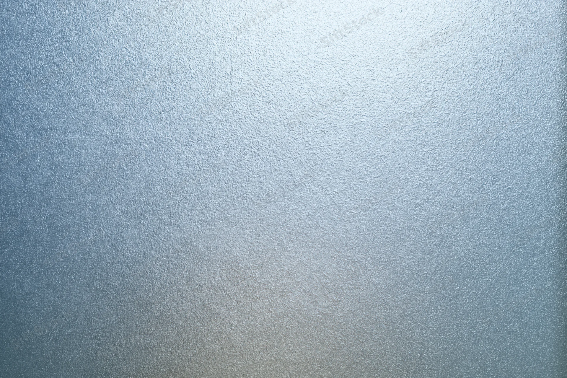 Frosted glass surface with smooth translucent texture filling the frame