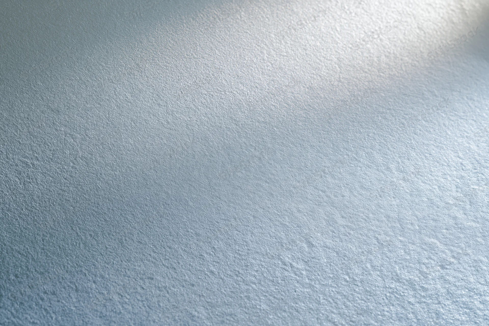 Frosted glass surface with smooth texture and light diffusion filling the frame