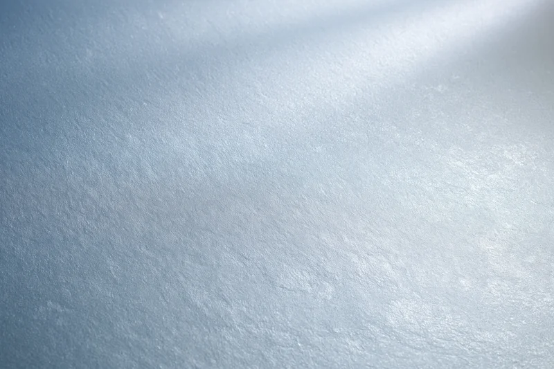 Frosted glass surface in close-up flat lay filling the frame