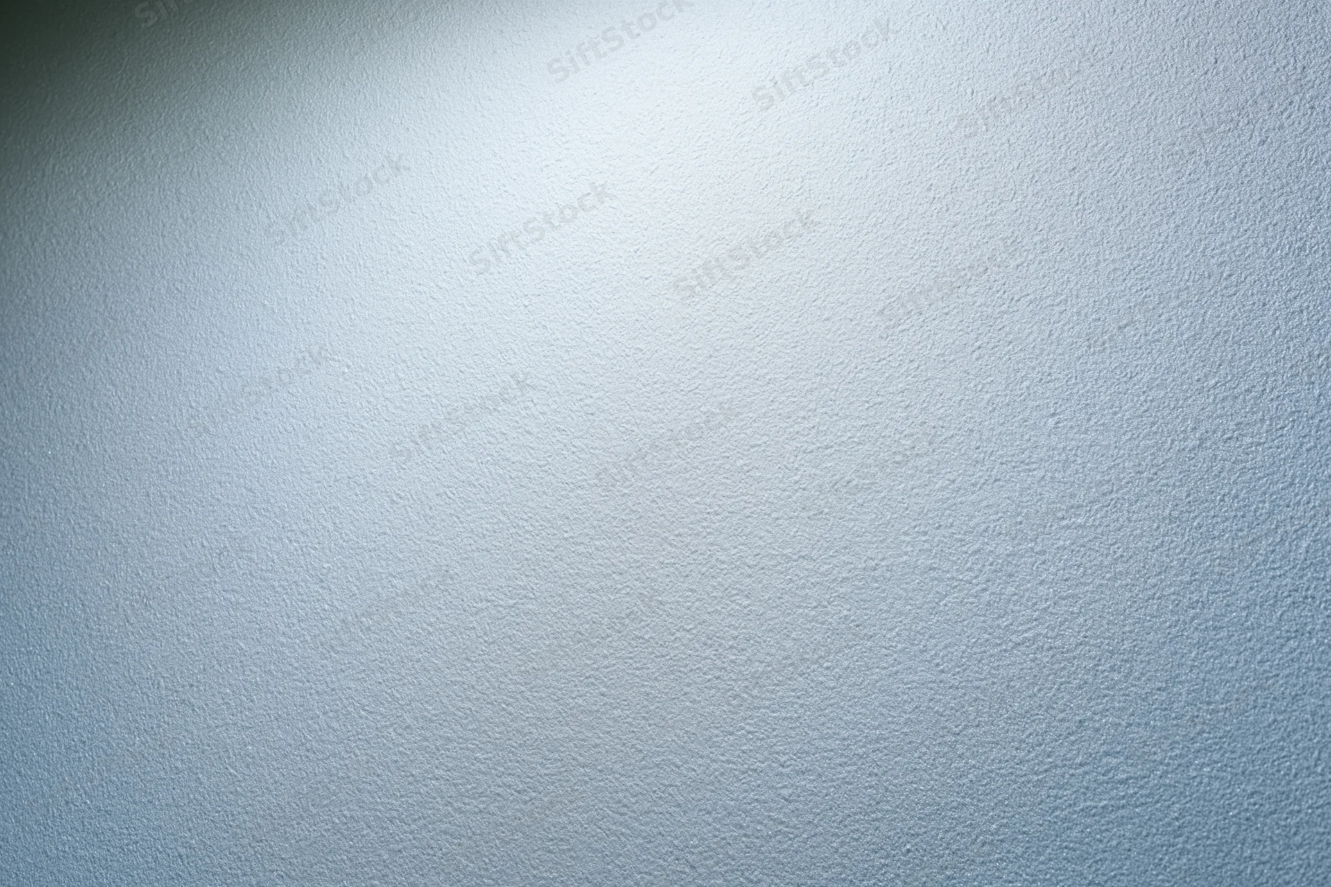 Frosted glass surface with soft light gradient and matte texture as background