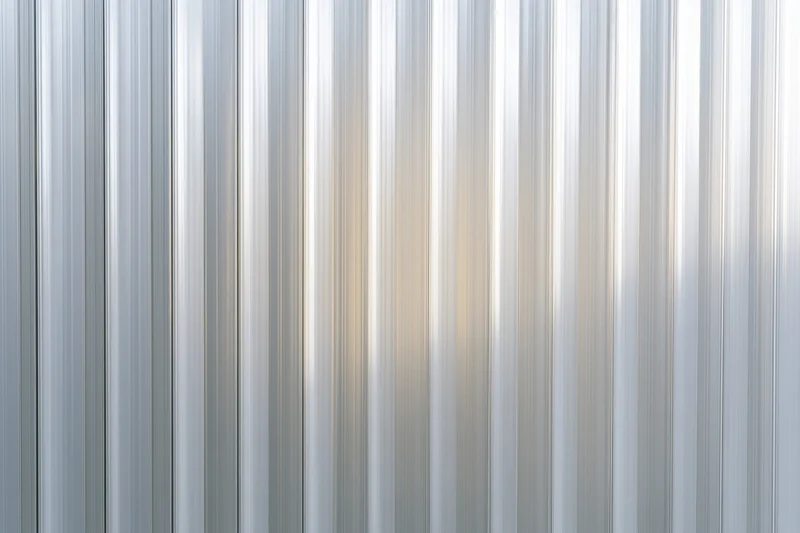 Ribbed translucent polycarbonate sheet for building and roofing applications