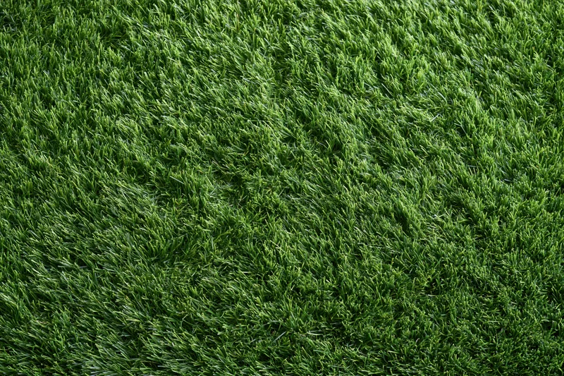 Dense artificial turf surface viewed from overhead in a flat lay arrangement
