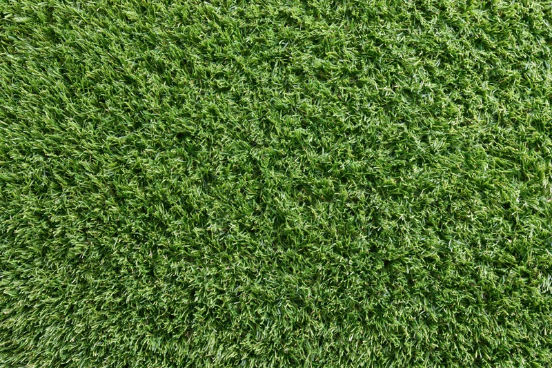 Close-up overhead view of uniformly trimmed artificial turf surface