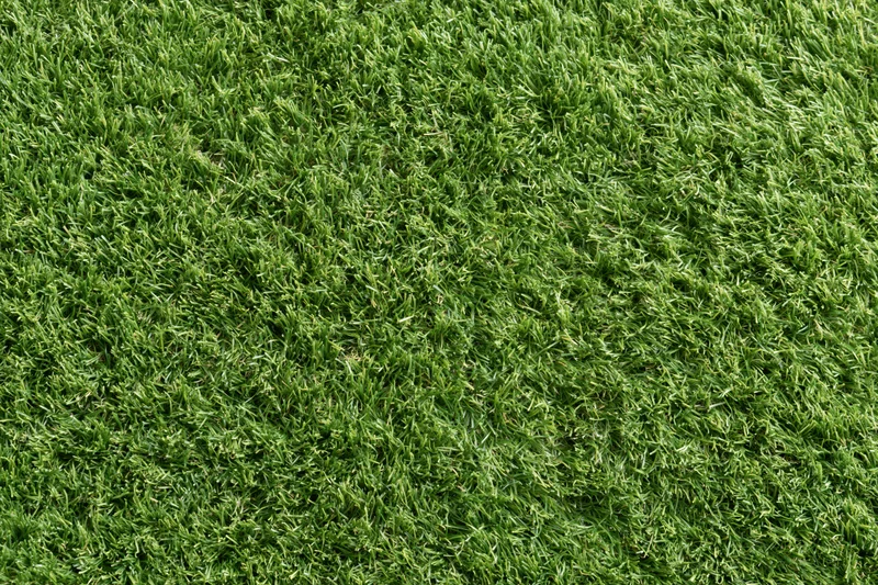 Closely mown artificial turf surface filling the frame