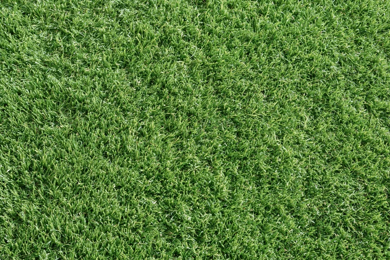 Closely mown artificial turf surface filling the frame